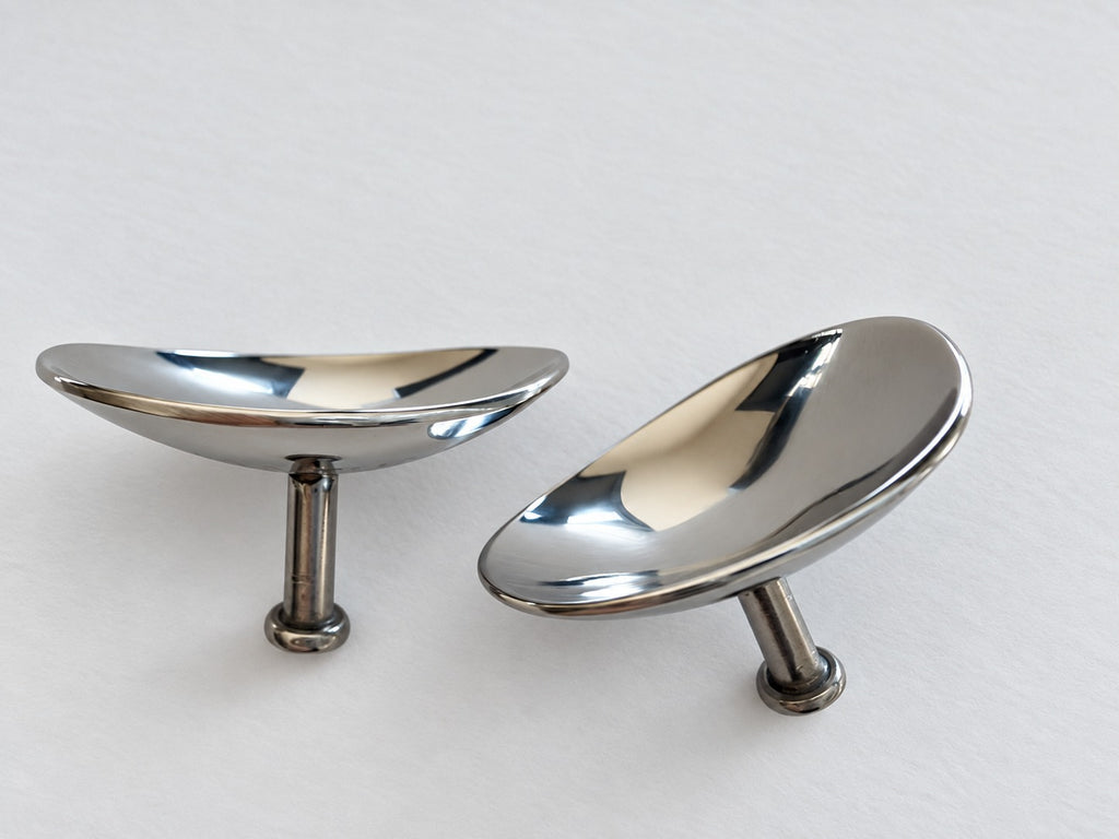 Two iQUANTUM SHIELD eye shields showing the concave inner surface