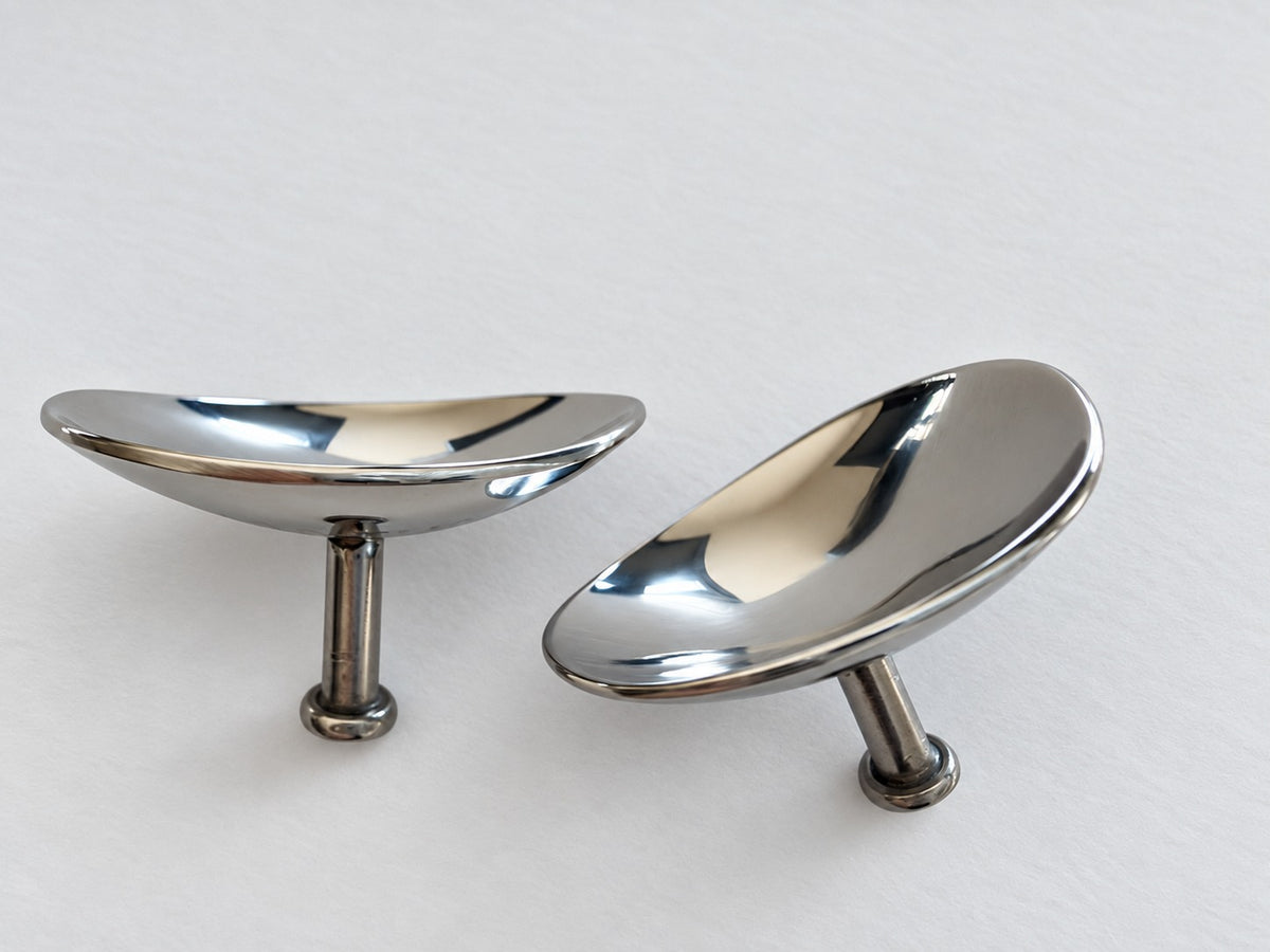 Two iQUANTUM SHIELD eye shields showing the concave inner surface