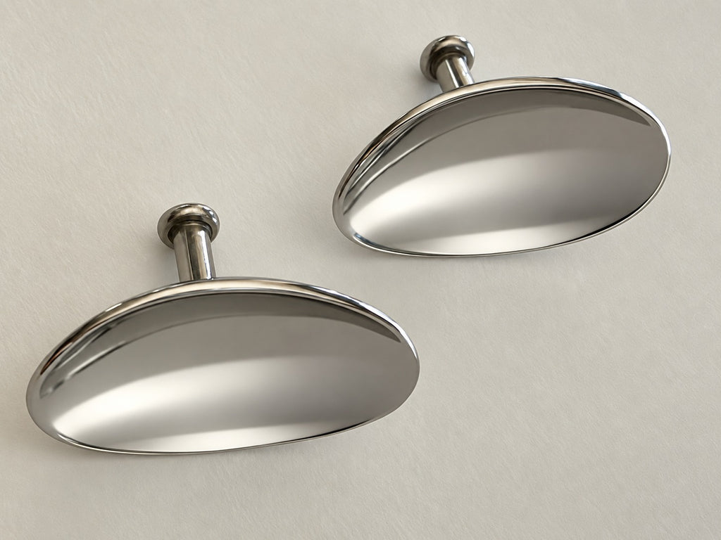 Two iQUANTUM SHIELD eye shields, convex outer surface